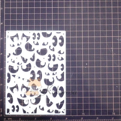 Kokorosa Metal Cutting Dies with Staring Eyes Background Board